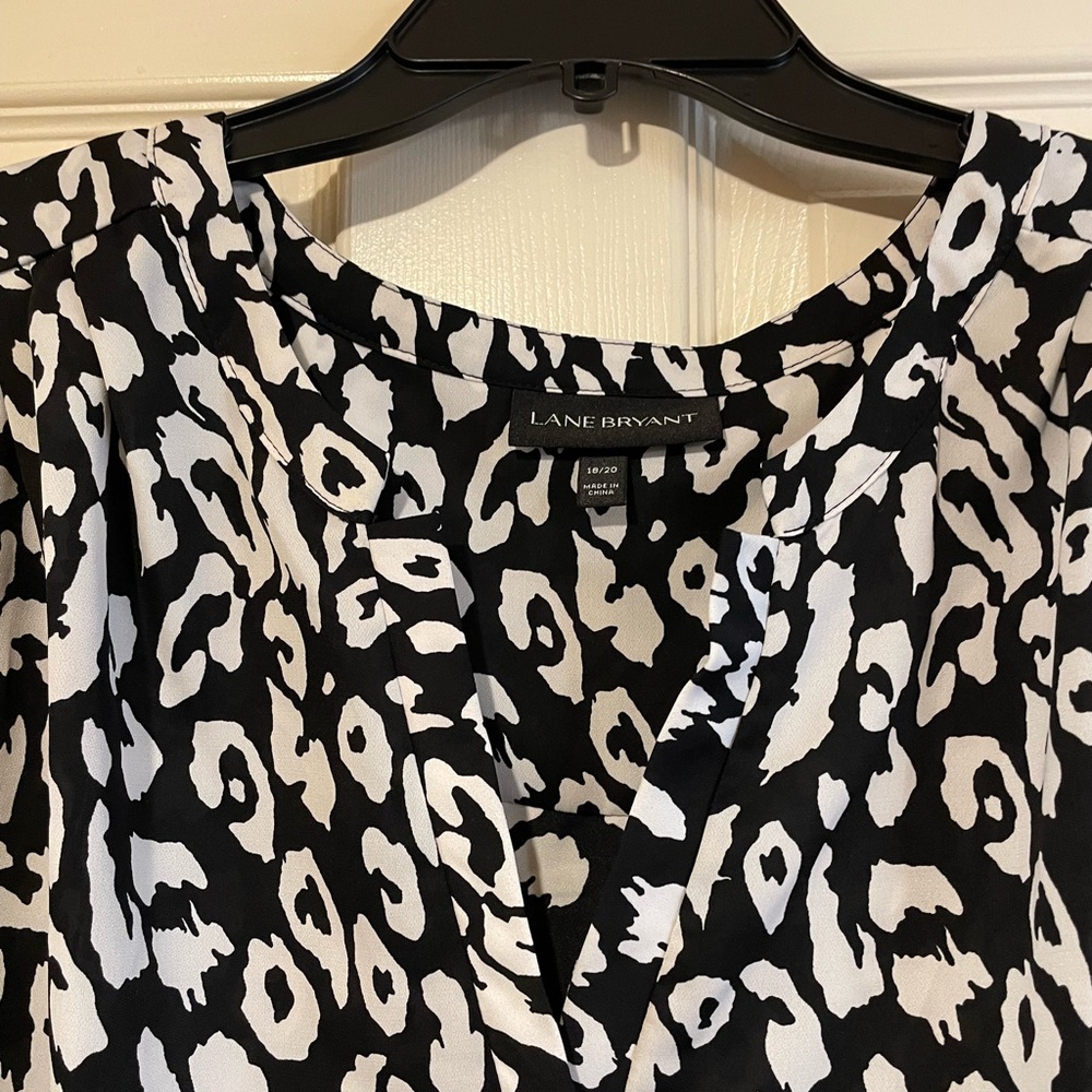 Lane Bryant Monochrome Animal Print Blouse. Sleeves button up to quarter length.